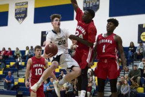 Freeport's no. 24 Ben Beale attempts a lay-up in the first half of the game against Indiana on Friday, December 22, 2017.