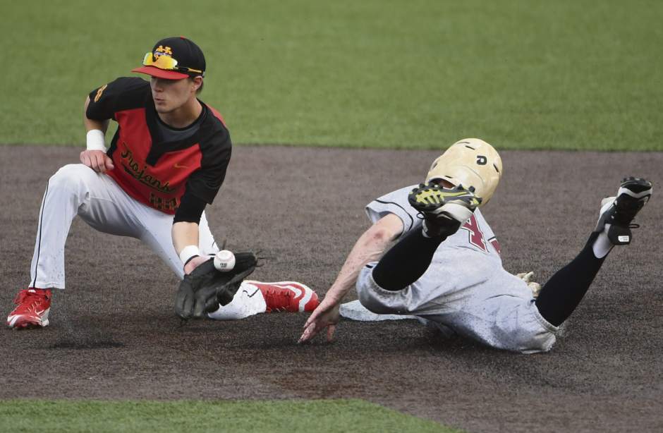 Serra Catholic's Zack Bowen is safe at second before the throw to Cardinal Wuerl North Catholic's Robby Randolph during the WPIAL 2-A Baseball championship Tuesday, May 29, 2018 at Wild Things Field.