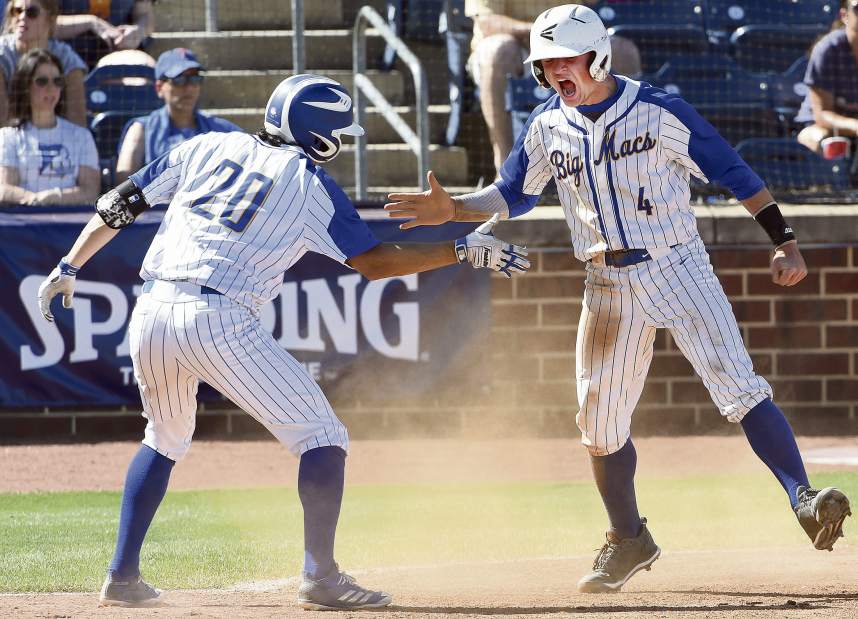 Canon-McMillan's Brandon Kline (4) celebrates with Nick Seafino after scoring during the PIAA Class 6A state championship game against Bensalem Friday, June 15, 2018, at Penn State University.