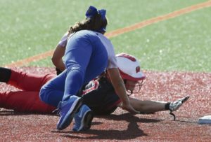 Hempfield's Olivia Persin tags out Warwick's Danielle Jones at second during first round PIAA 5-A softball action Monday June 4, 2018 at Greater Latrobe High School.