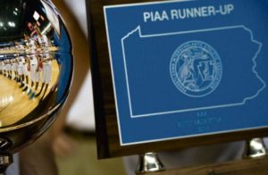 Mars Area is reflected in their runner-up trophy after their game against Neumann-Goretti during the PIAA Class AAA boys basketball championship on Friday, March 18, 2016 at the Giant Center in Hershey, Pa. Neumann-Goretti won 99-66.