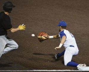 Canon-McMillan first baseman Ian Hess stretches for the throw for an out of North Allegheny's Turner White during the WPIAL 6-A Baseball Championship Wednesday May 30, 2018 at Wild Things Park.