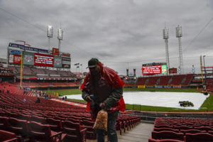 Fans leave the stands after a postponement between the Cincinnati Reds and Pirates on Saturday, March 30, 2019, in Cincinnati.