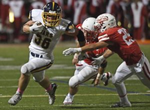 Mars’ Teddy Ruffner gains yards outside on North Hills Friday, Oct. 4, 2019 at Martorelli Stadium.
