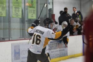 Greensburg Salem’s Brendon Linderman celebrates a score on Bishop McCort on Thursday, Feb. 13, 2020, at Kirk S. Nevin Arena in Greensburg.