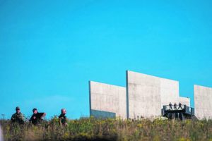 Security watches from the memorial plaza above the crowd on Sept. 11, 2019, for the 9/11 Memorial Service at the Flight 93 National Memorial near Shanksville.