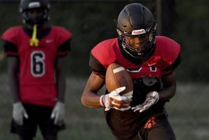 Aliquippa’s Darious Dixon catches a pass during a preseason practice.