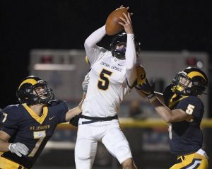 Central Catholic’s Anderson Cynkar catches a touchdown pass over Mt. Lebanon’s Jack Smith (7) and Alex Tecza during the first quarter of their WPIAL Class 6A semifinal on Friday, Oct. 30, 2020, at Mt. Lebanon.