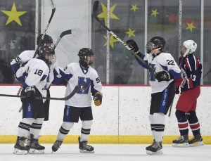 Hempfields Nicholas Bruno (56) celebrates his first goal with Tyler Planey (18), Aiden Dunlap (22) and Logan Eisaman during their game against Shaler on Thursday, Dec. 3, 2020, at Kirk Nevin Arena. Bruno scored twice, as Hempfield won, 6-2.