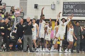 Lincoln Park’s bench celebrates after a 3-pointer against Aliquippa during last year’s WPIAL Class 3A semifinals.