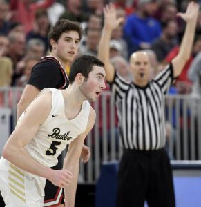 Butler’s Mattix Clement reacts after making a 3-pointer against Upper St. Clair during a state playoff game last season.