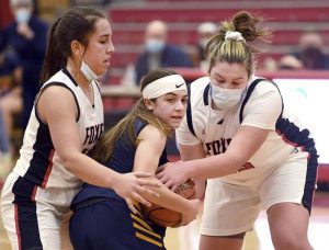 Fox Chapel’s Sarah Slember (left) and Ellie Schwartzman battle Mars’ Alexa McDole for a loose ball during their game on Saturday, Jan. 9, 2020, at Fox Chapel Area High School.