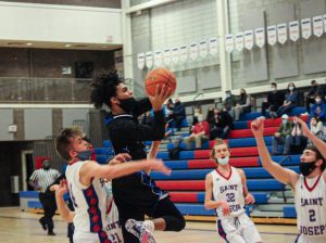 Leechburg sophomore Braylan Lovelace goes up for a layup against St. Joseph during their Section 3-A matchup Feb. 12, 2021.