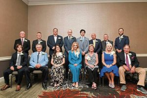 WPIAL Hall of Fame inductees who attended the banquet Friday included: (front row, from left) James Gulibon, Denny Papalia, Natalie Bower Toman, Katie Miller Gee, Debra Pickens (sitting in for daughter Samantha), Amy Caprino and David Hays; (back row, from left) Joe Maize, Uwe Schneider, Ed Josefoski, Gene Klein, Anthony Chiccitt, Joe Tranchini, Tom Evans and Rob Gagliani.