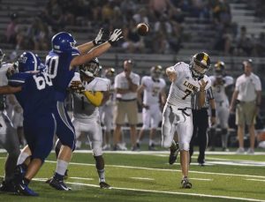 Hempfields Kolbe Roscov tries to block a pass by Greensburg Salems Hayden Teska during a game Friday, Aug. 27, 2021, at Hempfield.