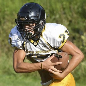 Thomas Jefferson running back Conner Murga carries during practice on Aug. 23, 2021, in Jefferson.