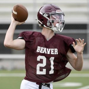 Beavers Wyatt Ringer throws a pass during practice.