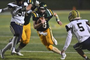Penn-Traffords Carter Green cuts back on Franklin Regionals Tyler Bewszka for a first-quarter touchdown on Friday, Oct. 22, 2021, at Warrior Stadium.