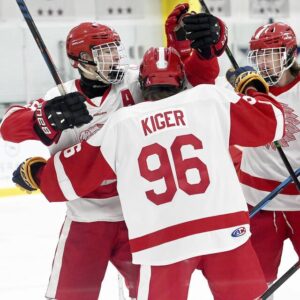 North Hills’ Toby Kiger celebrates his goal with Owen Sroka and Nathan Hazen during their game against North Catholic on Monday, Nov. 28, 2022, at RMU Island Sports Center.