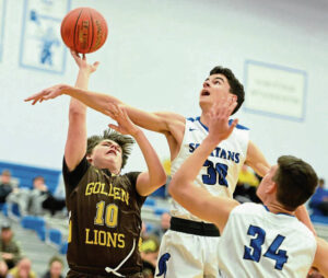 Hempfields Drew Gordon defends Greensburg Salems Ryan Burkhart during the Hempfield tip-off tournament Friday.