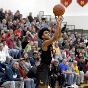 Lincoln Parks Brandin Cummings shoots a 3-pointer during a WPIAL Class 4A quarterfinal against North Catholic last season.