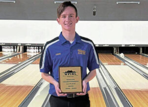 Plums Cade Schimmer won the WPIBL boys singles championship Wednesday.