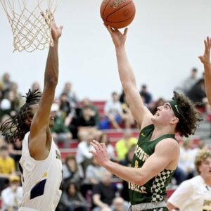 Seton LaSalles Connor Spratt scores his 1,000th career point against Shady Side Academys Nate Mallory during their WPIAL Class 3A playoff game on Wednesday, March 1, 2023, at Fox Chapel High School.