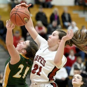Avonworths Greta OBrien blocks a shot by Forest Hills Arissa Britt during their PIAA Class 3A first-round state playoff game on Friday, March 10, 2023, in Ross.
