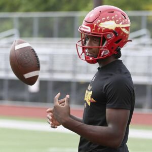 Penn Hills quarterback Julian Dugger threw for 140 yards and two touchdowns Friday night.