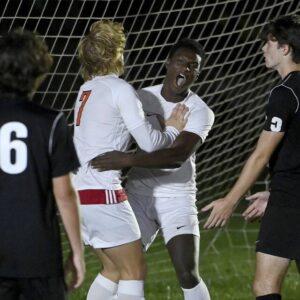 Springdale’s John Duku celebrates with Billy Lawrence after scoring against Riverview during their game on Thursday, Sept. 21, 2023, at Riverside Park in Oakmont.