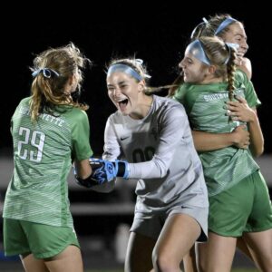 Christopher Horner | Tribune-Review
                                South Fayette goalkeeper Caitlyn Thompson celebrates with Reagan McLaughlin after defeating Montour, 3-0, on Wednesday, Sept. 27, 2023, at South Fayette.