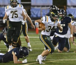 Penn-Traffords Tasso Whipple steps out of the tackle attempt by Norwins Michael Crnkovic on the way to a third-quarter touchdown Friday, Sept. 29, 2023, at Norwin High School.