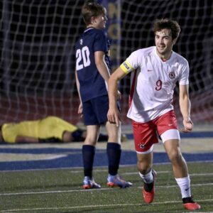 Peters Twp.’s Nathan Froelich celebrates after scoring against Norwin during the first half on Tuesday, Oct. 3, 2023, at Norwin.