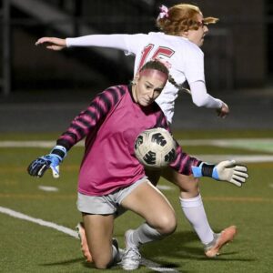 South Fayette goalkeeper Caitlyn Thompson makes a save on Moons Elizabeth Gallup during their game Monday at South Fayette.