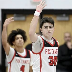 Fox Chapels Thomas Patterson celebrates after hitting a 3-pointer against Hempfield on Tuesday, Dec. 5, 2023, at Fox Chapel.