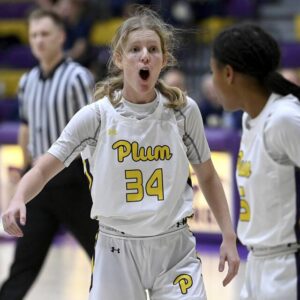 Plum’s Megan Marston celebrates with Tamia West after scoring against Franklin Regional during their game on Monday, Dec. 18, 2023, at Plum.
