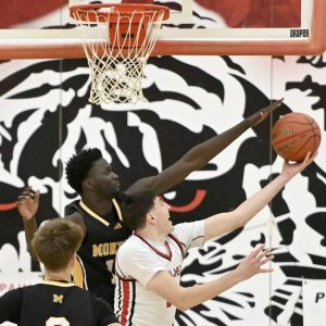 Montour’s Ama Tening Sow defends against Moon’s Michael Santicola during their game on Jan. 14.