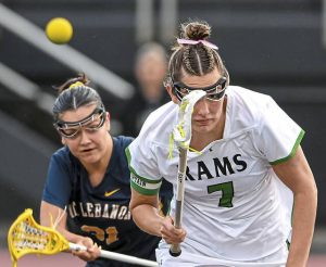 Pine-Richlands Cate Gentile (7) and Mt. Lebanons Quinn Murdoch (31) race for a loose ball in the WPIAL Class 3A championship game May 22 at Upper St. Clair.
