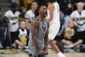 West Virginia guard Javon Small celebrates after hitting a 3-pointer against Colorado last season.
