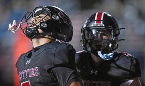 Southmoreland’s Jackson Mickens (left) reacts with teammate Ty Whoric after scoring just before halftime during a game last season.