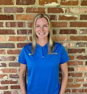 Kim Masarik was hired as the new Hampton boys cross country coach in June to replace Dean Longwell, who stepped down after 15 seasons.