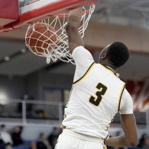 Quaker Valley’s Adou Thiero dunks against Lincoln Park during a WPIAL Class 4A semifinal on Saturday, Feb. 26, 2022, at UMPC Events Center in Moon.