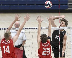 North Allegheny’s Will Robertson scores against Cumberland Valley’s Avery Reynolds and Isaiah Sibbitt during the PIAA Class 3A championship match on Saturday, June 14, 2025, at Penn State.