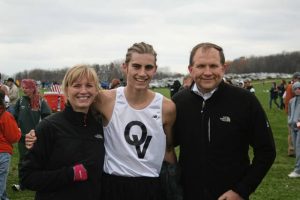 Quaker Valley’s LJ Westwood poses with his parents, Stacey Westwood-Zunic and Joe Zunic, at the WPIAL cross country championships during his junior season.