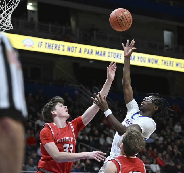 Chartiers Valley’s Julius Best scores over Peters Township’s Jake Wetzel during the WPIAL Class 5A championship Saturday, March 1, 2025 at Petersen Events Center.