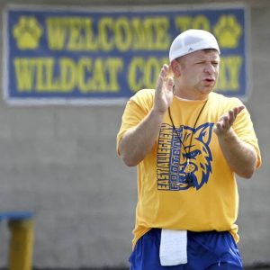 East Allegheny head coach Dom Pecora works his team during practice on Tuesday, Aug. 16, 2022, in North Versailles.