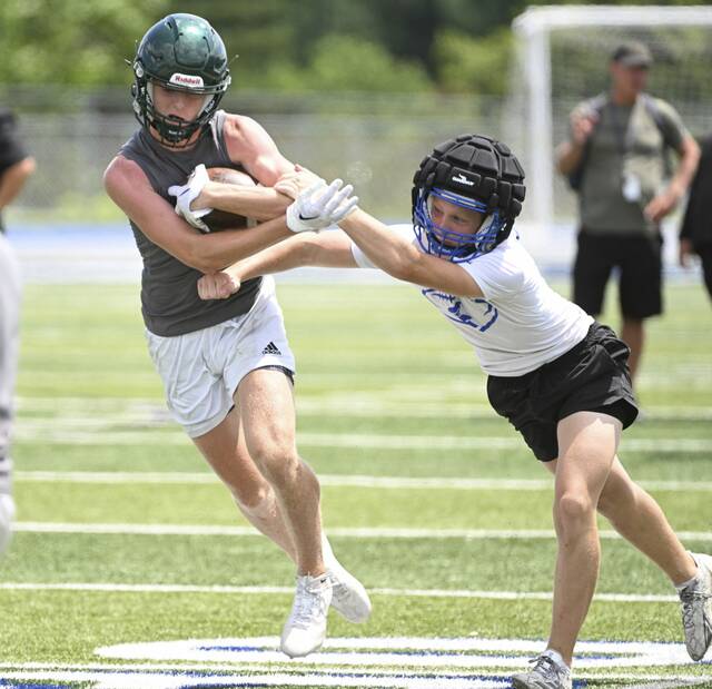 Penn-Trafford’s Nick Ponko pulls in a catch against Hempfield in the finals during the Westmoreland County Larry Sellitto Memorial 7-on-7 Championship.