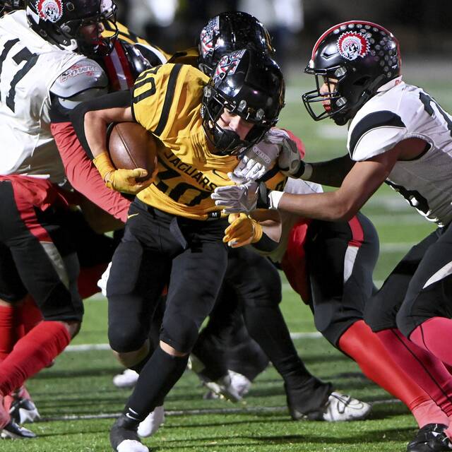 Thomas Jefferson’s Tyler Eber carries through the Aliquippa defense during the WPIAL Class 4A semifinals Nov. 8, 2024, at Chartiers Valley.
