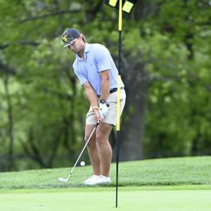 Nick Turowski chips onto the 18th green during the U.S. Open qualifier May 13 at Quicksilver Golf Club.