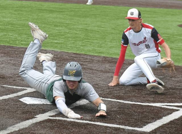 Bushy Run shortstop Brody Hoffman scores on a wild pitch during the District 31 American Legion championship game.
